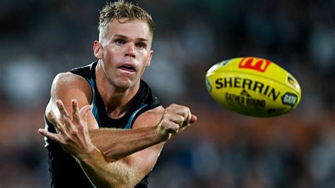 Dan Houston to remain at Port Adelaide in 2025 despite trade .
